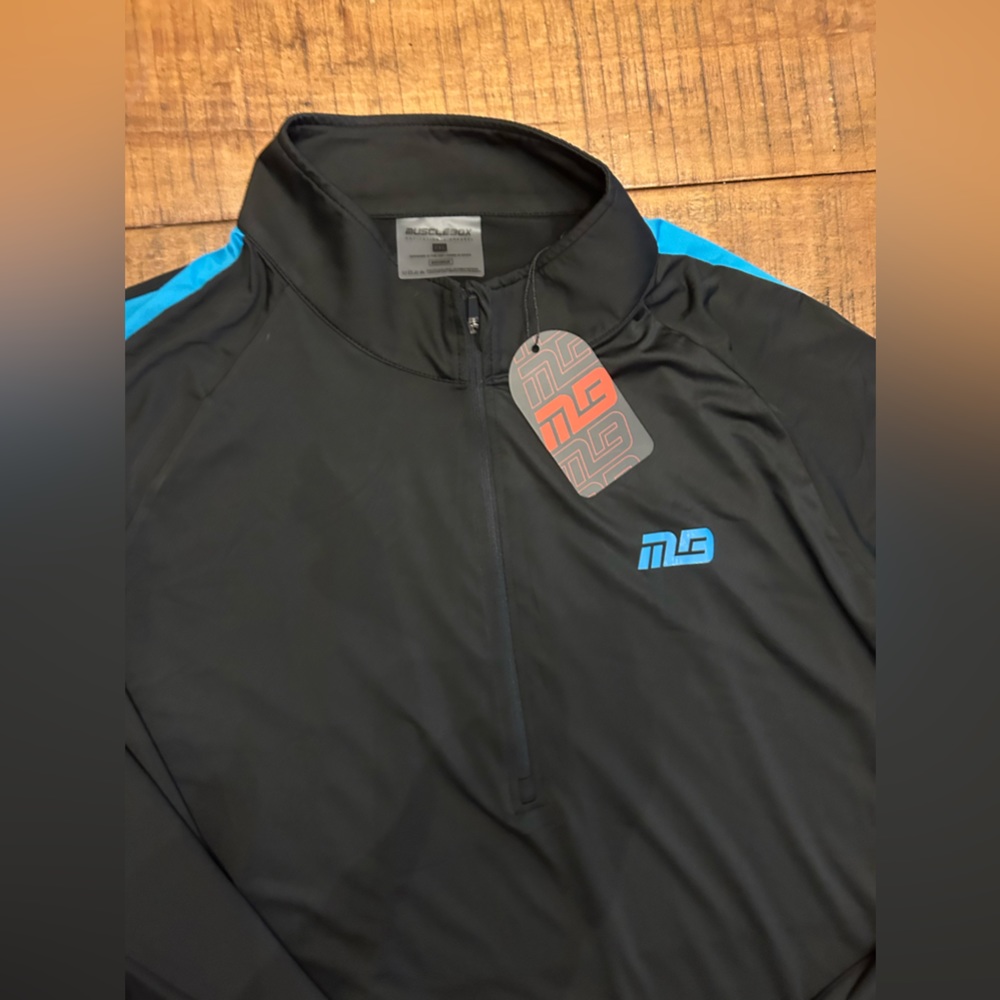 New with tags: Quarter-zip Jacket - Picture 2 of 3